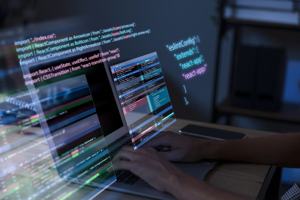 programming-background-with-person-working-with-codes-computer (1)